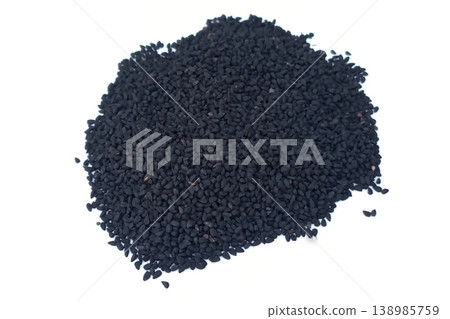 Black cumin seeds pile isolated on white background Black cumin seeds pile isolated on white background 138985759
