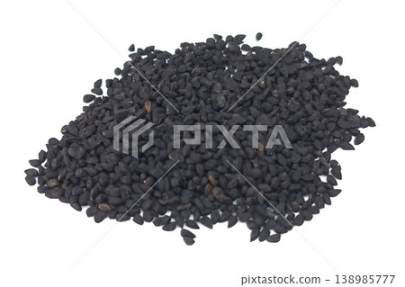 Black cumin seeds pile isolated on white background Black cumin seeds pile isolated on white background 138985777