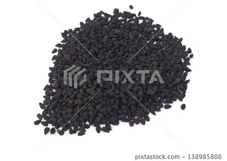 Black cumin seeds pile isolated on white background 138985808