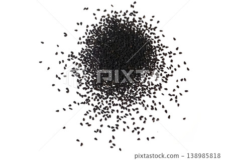 Black cumin seeds pile isolated on white background Black cumin seeds pile isolated on white background 138985818