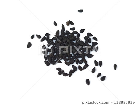 Black cumin seeds pile isolated on white background Black cumin seeds pile isolated on white background 138985939