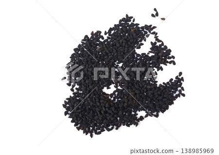 Black cumin seeds pile isolated on white background 138985969