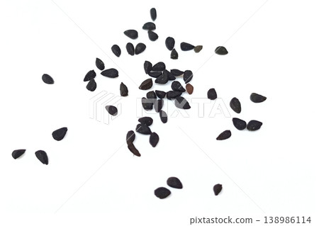 Black cumin seeds pile isolated on white background 138986114