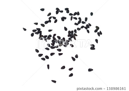 Black cumin seeds pile isolated on white background Black cumin seeds pile isolated on white background 138986161
