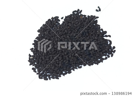 Black cumin seeds pile isolated on white background 138986194