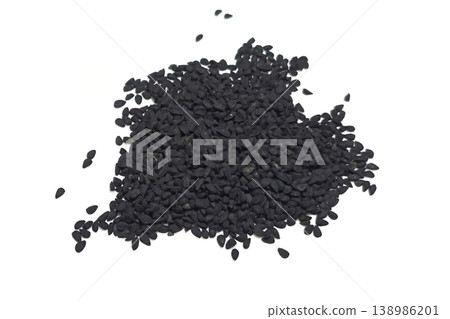 Black cumin seeds pile isolated on white background Black cumin seeds pile isolated on white background 138986201