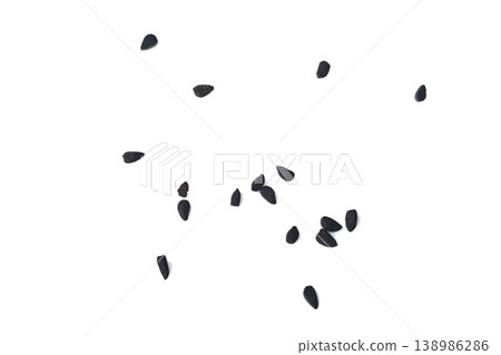 Black cumin seeds pile isolated on white background Black cumin seeds pile isolated on white background 138986286