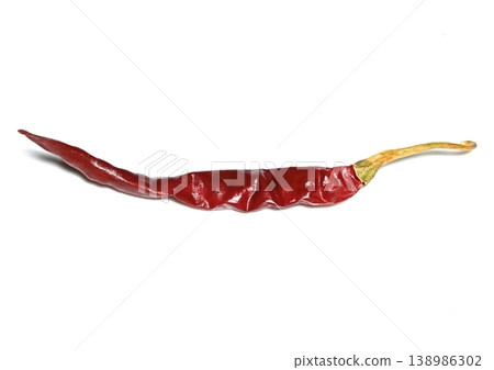 Dry red pepper isolated on white background Dry red pepper isolated on white background 138986302