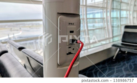 Charging facilities near the boarding gates at Haneda Airport Charging facilities near the boarding gates at Haneda Airport 138986757