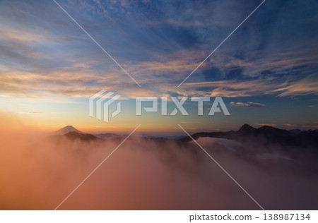 Mount Fuji and Kitadake/Ainodake at dawn as seen from Kai-Komagatake 138987134