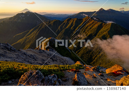 Mount Fuji and Kitadake/Ainodake at sunrise as seen from Kai-Komagatake. 138987140