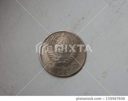 Circulated coin used in everyday transactions 138987698