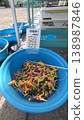 A scene with street stalls and festival booths. 138987846