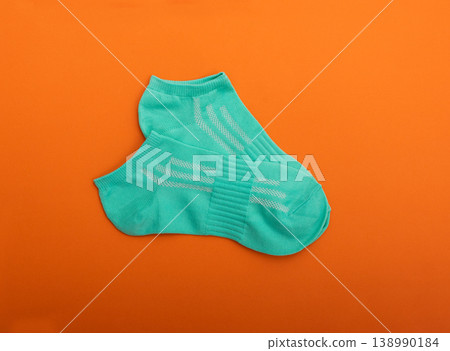 One green sock on pure white background. 138990184