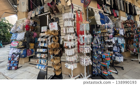 Greek miscellaneous goods in front of a souvenir shop 138990193