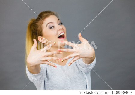 Happy woman showing her hands 138990469