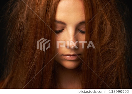 Depression, thinking or sad woman in studio with trauma stress, fail or bad results alone. Black background, psychology or face of a lonely female person with anger, messy hair or moody attitude 138990993