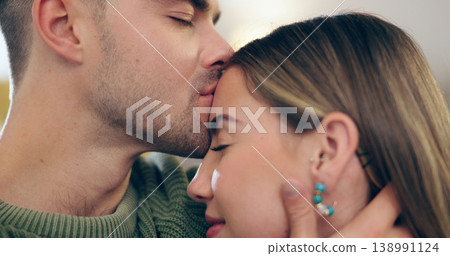 Couple, kiss and forehead for love, support and trust in relationship, romance and security in marriage. Happy people, connection and commitment or gratitude, bonding and hug or affection in closeup Couple, kiss and forehead for love, support and trust in relationship, romance and security in marriage. Happy people, connection and commitment or gratitude, bonding and hug or affection in closeup 138991124