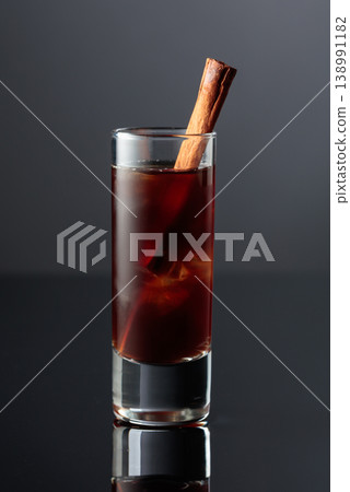 Coffee liquor with ice in tall glass. 138991182