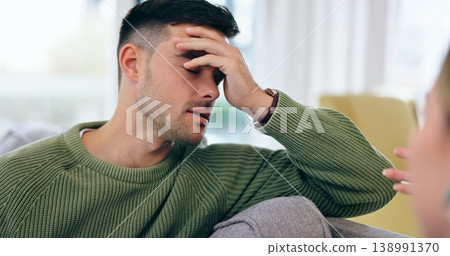 Man, headache and fight on sofa in home with discussion, talk and frustration with spouse for infidelity, lies or cheating. Husband, hand and stress for conversation, divorce and conflict with wife Man, headache and fight on sofa in home with discussion, talk and frustration with spouse for infidelity, lies or cheating. Husband, hand and stress for conversation, divorce and conflict with wife 138991370