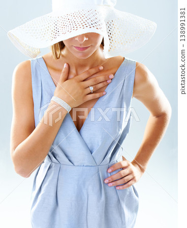 Woman, fashion and luxury aesthetic with jewelry in studio, young person and trendy style by blue background. Model, ring and feminine with designer clothes, hat and elegant dress or diamond ring Woman, fashion and luxury aesthetic with jewelry in studio, young person and trendy style by blue background. Model, ring and feminine with designer clothes, hat and elegant dress or diamond ring 138991381
