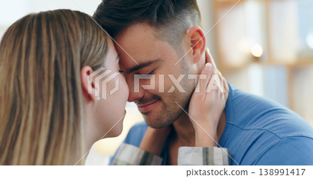Love, smile and young couple bonding at apartment on romantic date with intimate moment. Happy, positive and man and woman from Canada with cute forehead affection for romance together at modern home Love, smile and young couple bonding at apartment on romantic date with intimate moment. Happy, positive and man and woman from Canada with cute forehead affection for romance together at modern home 138991417
