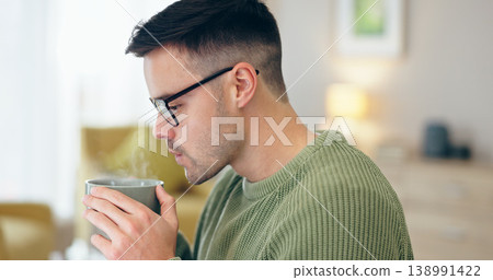 Closeup, man and drinking of coffee in home for relaxing, comfort or delicious taste in morning. Person, male entrepreneur and glasses for remote work with steam for espresso, latte or cappuccino Closeup, man and drinking of coffee in home for relaxing, comfort or delicious taste in morning. Person, male entrepreneur and glasses for remote work with steam for espresso, latte or cappuccino 138991422