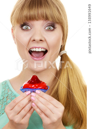 Woman holds cake strawberry cupcake Woman holds cake strawberry cupcake 138991649