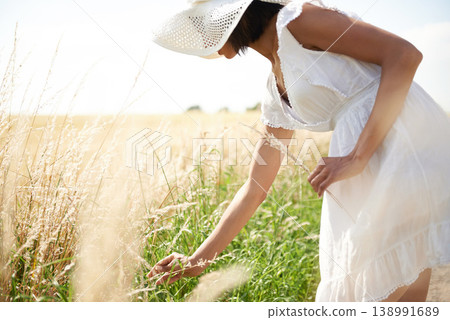 Sunshine, wheat field and woman with nature, summer and environment with break, weekend and landscape. Person, girl and traveller with freedom, exploring and plants with ecology, spring and grass Sunshine, wheat field and woman with nature, summer and environment with break, weekend and landscape. Person, girl and traveller with freedom, exploring and plants with ecology, spring and grass 138991689