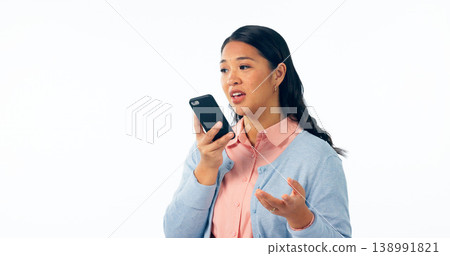 Woman, communication and phone call with speaker in studio for voice app, sound translation or contact on white background. Asian model, mobile network or microphone for audio, speech or mockup space Woman, communication and phone call with speaker in studio for voice app, sound translation or contact on white background. Asian model, mobile network or microphone for audio, speech or mockup space 138991821