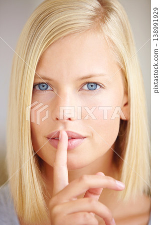 Woman, silence and finger on lips in portrait with sign, secret deal or story for promotion by background. Girl, hand and mouth for icon, whisper or gossip for quiet voice, news or privacy in closeup Woman, silence and finger on lips in portrait with sign, secret deal or story for promotion by background. Girl, hand and mouth for icon, whisper or gossip for quiet voice, news or privacy in closeup 138991929