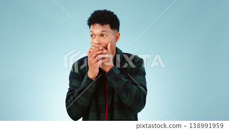 Surprise, wow and hands on face of man in studio with shocking, news or info on blue background. Omg, gossip and male model with emoji reaction or drama, announcement or secret, giveaway or promotion Surprise, wow and hands on face of man in studio with shocking, news or info on blue background. Omg, gossip and male model with emoji reaction or drama, announcement or secret, giveaway or promotion 138991959