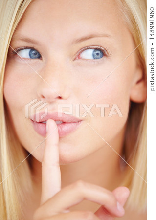 Woman, secret and finger on lips with thinking for sign, choice or deal with idea for skincare by background. Girl, hand and mouth for icon, whisper or gossip for decision, news or privacy in closeup Woman, secret and finger on lips with thinking for sign, choice or deal with idea for skincare by background. Girl, hand and mouth for icon, whisper or gossip for decision, news or privacy in closeup 138991960