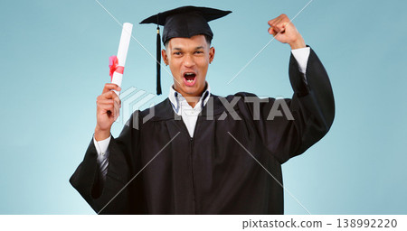 Graduation, man and celebration of certificate in education, college or university success isolated on a blue background. Portrait, african graduate and yes of award, diploma or achievement in studio 138992220