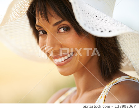 Portrait, smile and woman in hat at countryside or field in summer outdoor, beauty or health. Face, happy or young person at farm, nature or garden to travel on holiday, vacation or tourism in Brazil Portrait, smile and woman in hat at countryside or field in summer outdoor, beauty or health. Face, happy or young person at farm, nature or garden to travel on holiday, vacation or tourism in Brazil 138992367