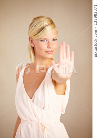 Woman, happy and wedding ring in studio with smile, thinking and engagement for commitment by background. Girl, model and jewelry for marriage proposal, diamond and ideas for celebration at ceremony 138992371