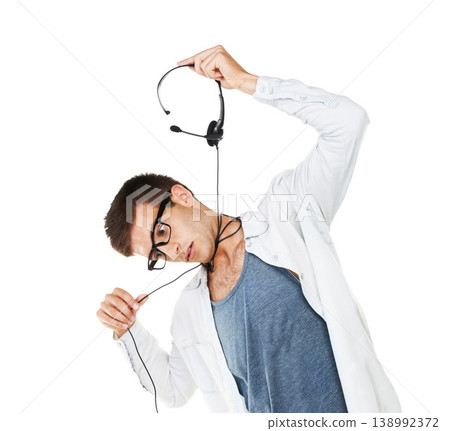 Work, suicide and man at call center with headset pretend to suffocate, choke or strangle neck with cord. Mental health, crisis and depressed businessman hanging with headphones in customer service Work, suicide and man at call center with headset pretend to suffocate, choke or strangle neck with cord. Mental health, crisis and depressed businessman hanging with headphones in customer service 138992372