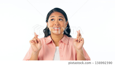 Hope, excited and woman with fingers crossed, winning and faith isolated on a white studio background. Person, girl and model with hand gesture, emoji and optimism with wish, mockup space or giveaway Hope, excited and woman with fingers crossed, winning and faith isolated on a white studio background. Person, girl and model with hand gesture, emoji and optimism with wish, mockup space or giveaway 138992390