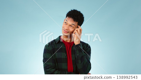 Man, thinking and doubt for decision, idea and face with question, unsure and isolated on blue studio background. Planning, confused and mockup space with solution mindset wonder and concentrate Man, thinking and doubt for decision, idea and face with question, unsure and isolated on blue studio background. Planning, confused and mockup space with solution mindset wonder and concentrate 138992543
