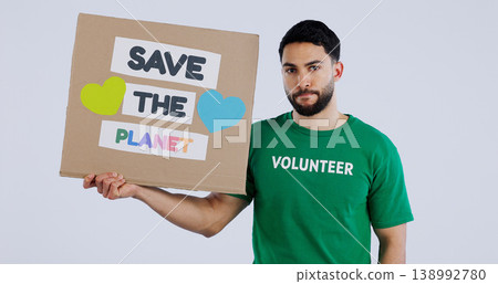 Volunteer man, poster and studio portrait to save the planet in global warming, crisis or ecology by background. Person, social responsibility and cardboard sign for sustainability for climate change 138992780
