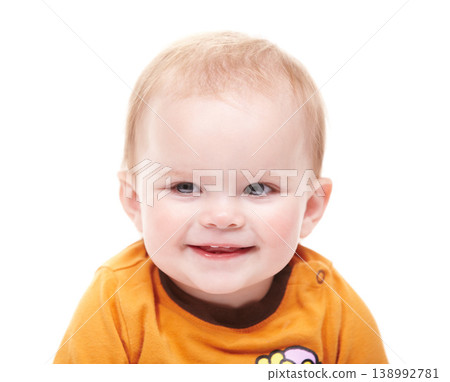 Smile, face of kid and young baby in studio isolated on white background or backdrop. Happy child, infant and cute blonde toddler, adorable girl in clothes and healthy newborn, excited or thinking 138992781