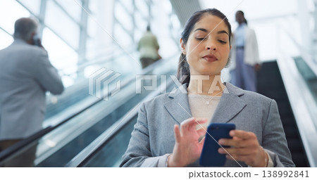 Business, escalator and travel with woman, cellphone and social media with accountant, employee and convention. Person, consultant or broker with a smartphone, airport and connection with digital app 138992841