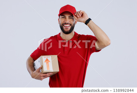 Portrait, happy man and courier with delivery in studio for mock up on white background in Mexico. Male model, smile and excited for logistics, shipping or distribution of package, parcel or order Portrait, happy man and courier with delivery in studio for mock up on white background in Mexico. Male model, smile and excited for logistics, shipping or distribution of package, parcel or order 138992844