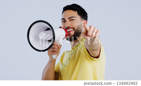 Man, megaphone and studio portrait to point at you for choice, recruitment or announcement by background. Speaker, protest or call to action for accountability with speech, sound or noise on bullhorn Man, megaphone and studio portrait to point at you for choice, recruitment or announcement by background. Speaker, protest or call to action for accountability with speech, sound or noise on bullhorn 138992902