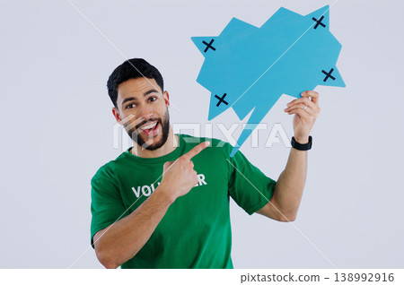 Portrait, man and volunteer with speech bubble, pointing and promotion on a white studio background. Face, person and charity worker with poster board, tracking markers and options with communication Portrait, man and volunteer with speech bubble, pointing and promotion on a white studio background. Face, person and charity worker with poster board, tracking markers and options with communication 138992916