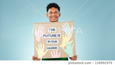 Man, protest poster and studio portrait for accountability to stop climate change by blue background. Happy volunteer person, social responsibility and vision for future, sustainability and ecology 138992978