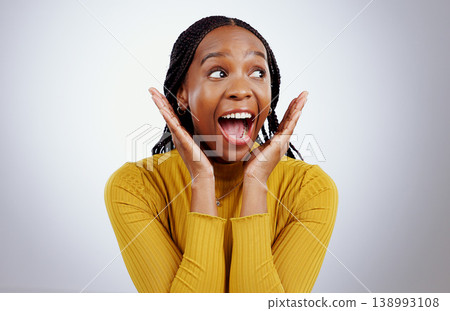 Surprise, wow and hands on face of black woman in studio for announcement, news or promo on grey background. Omg, emoji and excited African female model with secret, deal or giveaway, lotto or info Surprise, wow and hands on face of black woman in studio for announcement, news or promo on grey background. Omg, emoji and excited African female model with secret, deal or giveaway, lotto or info 138993108