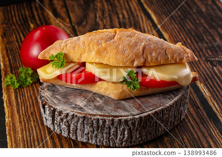 Sandwich with mozzarella and tomato Sandwich with mozzarella and tomato 138993486