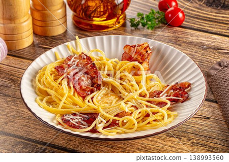 Italian classic spaghetti carbonara with bacon and egg Italian classic spaghetti carbonara with bacon and egg 138993560