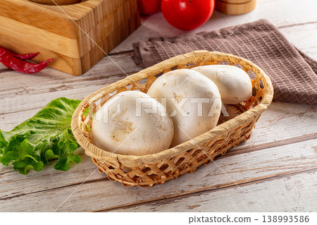 Raw white champignon mush heap Raw white champignon mush heap 138993586